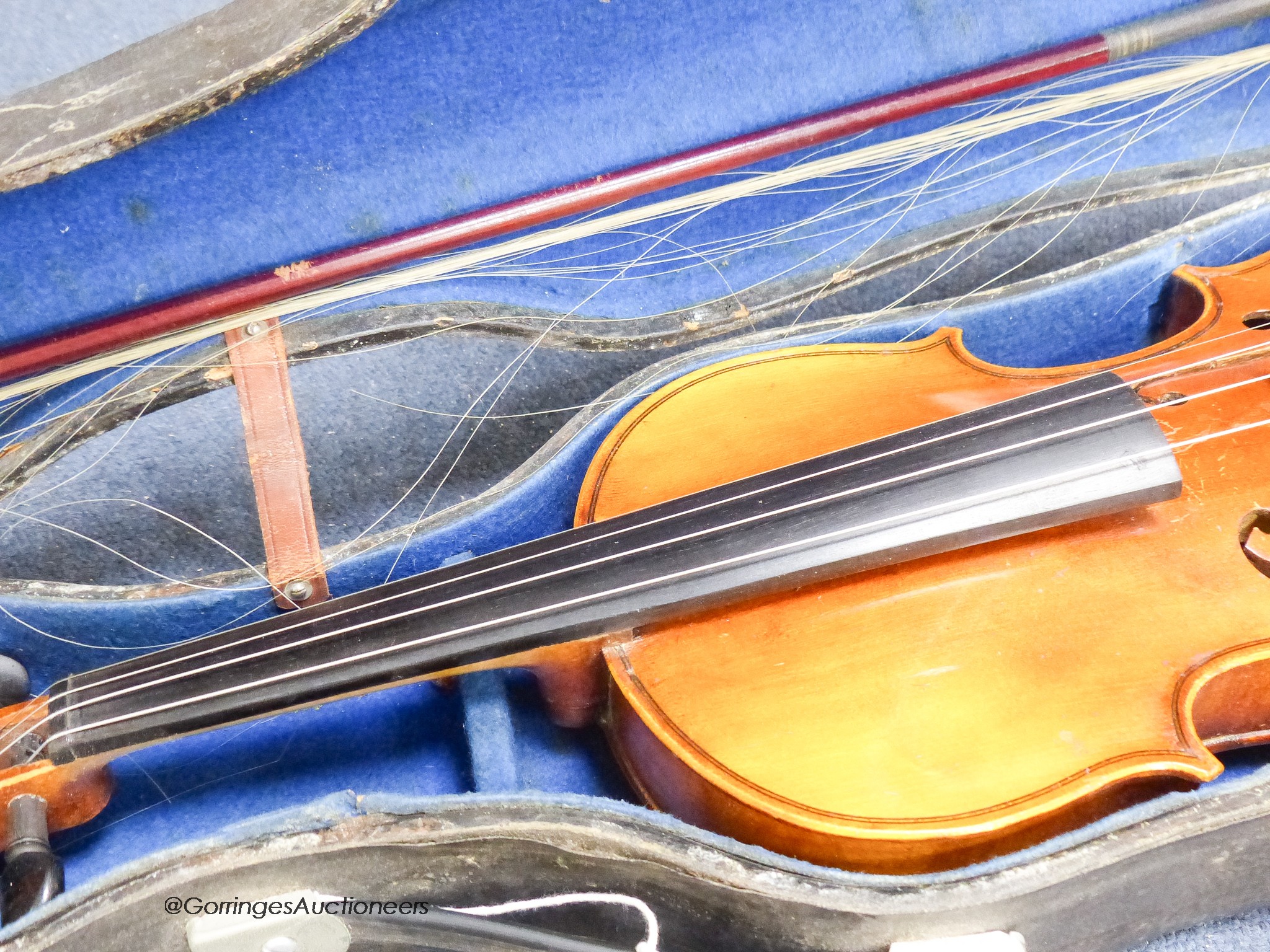 A student violin in case